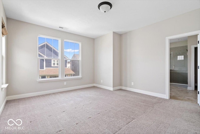 7012 Pickett Pl, Carmel, IN 46033 - spare room featuring carpet floors and baseboards
