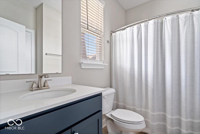 7012 Pickett Pl, Carmel, IN 46033 - full bathroom featuring toilet, vanity, and curtained shower