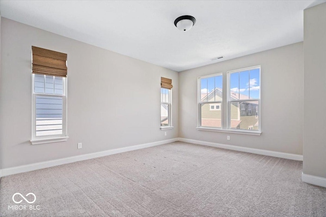 7012 Pickett Pl, Carmel, IN 46033 - carpeted spare room featuring baseboards
