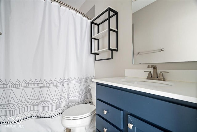 7012 Pickett Pl, Carmel, IN 46033 - bathroom featuring vanity, toilet, and a shower with curtain