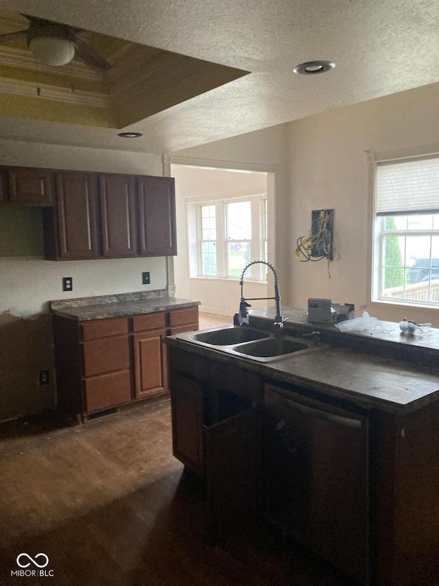 601 E Thompson St, Edinburgh, IN 46124 - kitchen with a sink, a wealth of natural light, dark countertops, and a textured ceiling