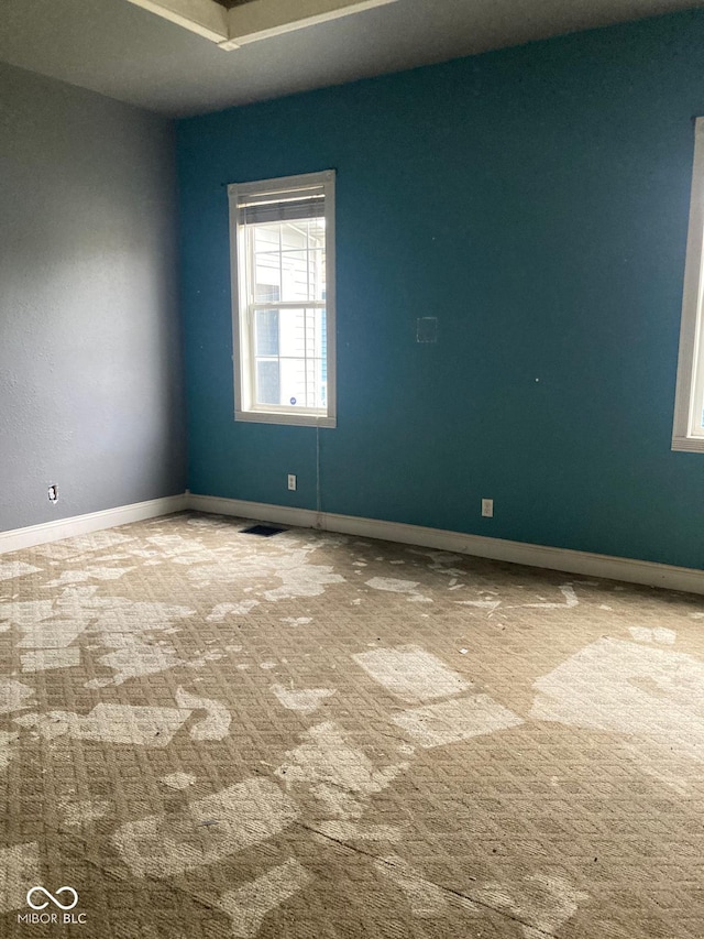 601 E Thompson St, Edinburgh, IN 46124 - spare room with carpet, visible vents, and baseboards