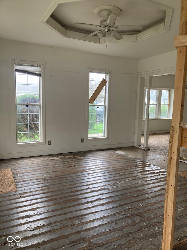 601 E Thompson St, Edinburgh, IN 46124 - empty room with a wealth of natural light, hardwood / wood-style flooring, and ceiling fan
