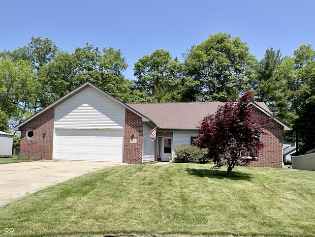 8809 Jonathon Pl, New Haven, IN 46774 - view of front facade with brick siding, a garage, concrete driveway, and a front yard