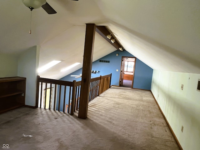 8809 Jonathon Pl, New Haven, IN 46774 - additional living space featuring a ceiling fan, carpet floors, and vaulted ceiling