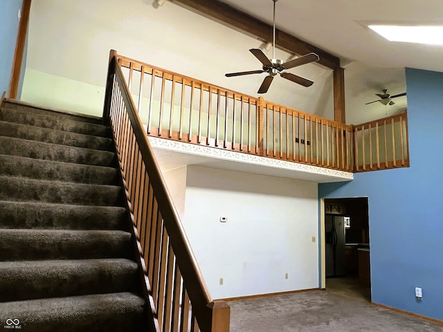 8809 Jonathon Pl, New Haven, IN 46774 - stairway with a ceiling fan, high vaulted ceiling, carpet floors, baseboards, and beam ceiling