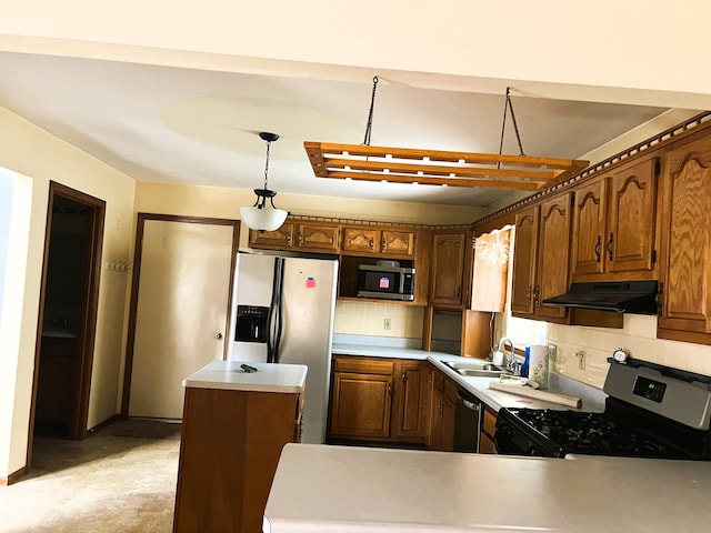 8809 Jonathon Pl, New Haven, IN 46774 - kitchen featuring appliances with stainless steel finishes, under cabinet range hood, decorative backsplash, and a sink