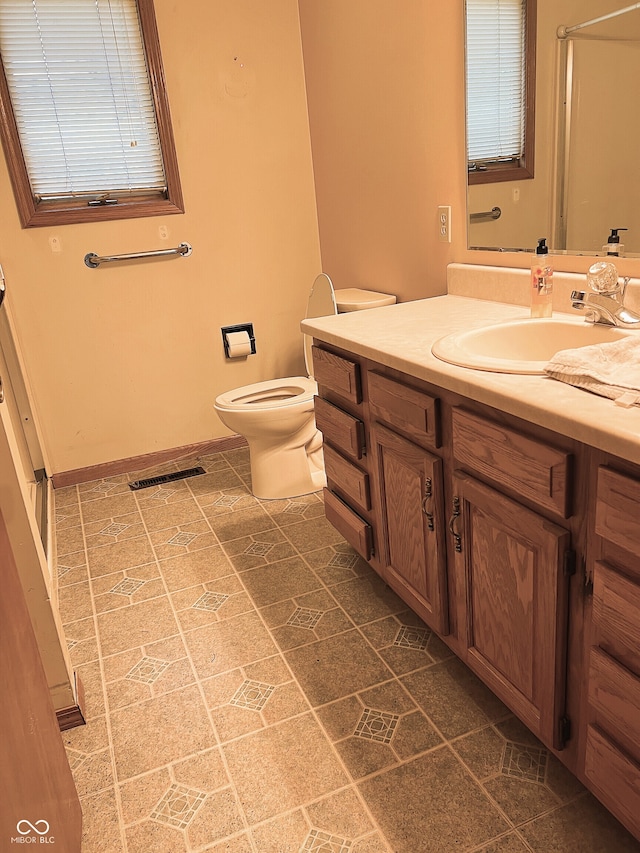 8809 Jonathon Pl, New Haven, IN 46774 - bathroom featuring vanity, toilet, and an enclosed shower