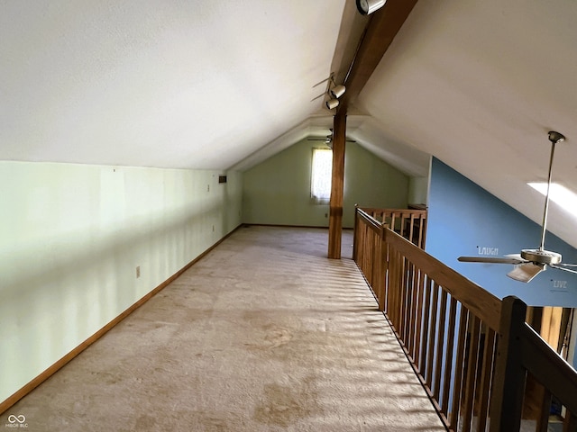 8809 Jonathon Pl, New Haven, IN 46774 - bonus room featuring carpet floors, vaulted ceiling, ceiling fan, and baseboards