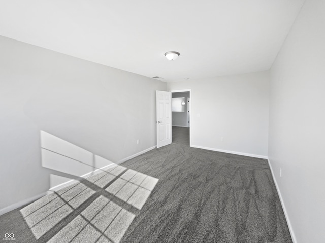 8251 Garden Ridge Rd, Indianapolis, IN 46237 - unfurnished room with dark colored carpet and baseboards
