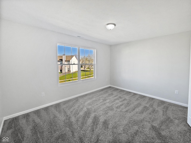 8251 Garden Ridge Rd, Indianapolis, IN 46237 - unfurnished room featuring dark colored carpet and baseboards