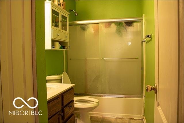 10105 Yosemite Ln, Indianapolis, IN 46234 - full bath featuring toilet, vanity, and combined bath / shower with glass door