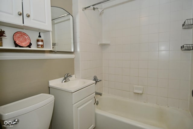 full bathroom with toilet, vanity, and shower / washtub combination