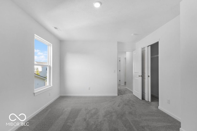1117 Stubble Run, Danville, IN 46122 - unfurnished bedroom featuring carpet, multiple windows, and a closet