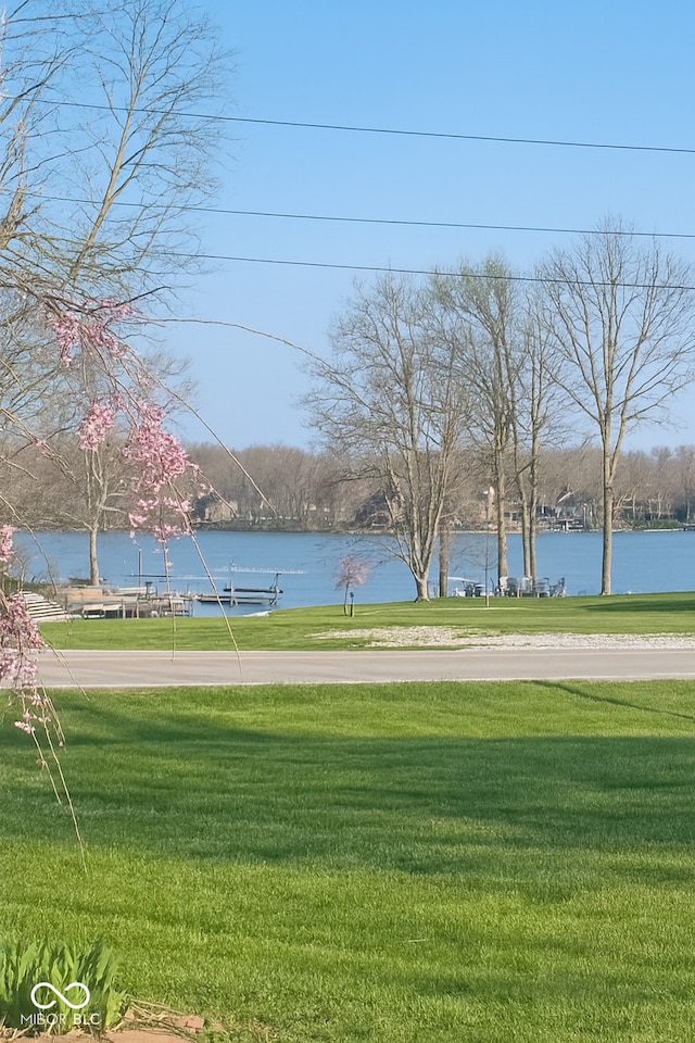 474 Mill, Coatesville, IN 46121 - surrounding community featuring a lawn and a water view