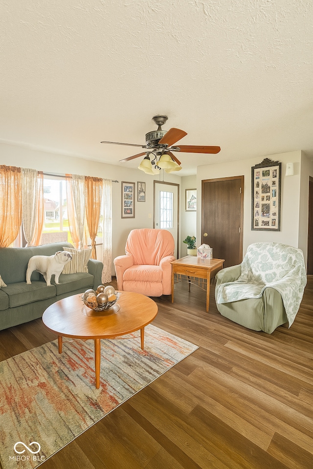 474 Mill, Coatesville, IN 46121 - living room featuring a textured ceiling, wood finished floors, and a ceiling fan