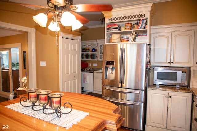 313 E Wabash Ave, Crawfordsville, IN 47933 - kitchen featuring white microwave, crown molding, ceiling fan, dishwasher, and stainless steel fridge
