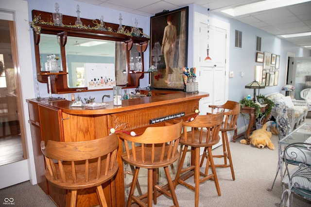 313 E Wabash Ave, Crawfordsville, IN 47933 - bar featuring carpet, a paneled ceiling, visible vents, and wet bar