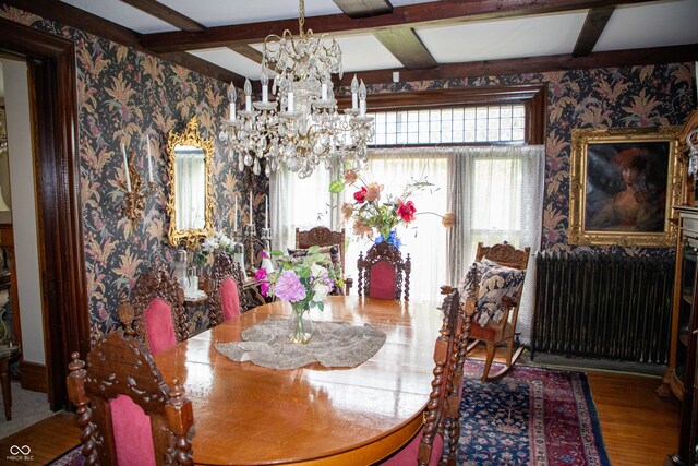 313 E Wabash Ave, Crawfordsville, IN 47933 - dining area featuring a chandelier, beamed ceiling, wallpapered walls, and radiator