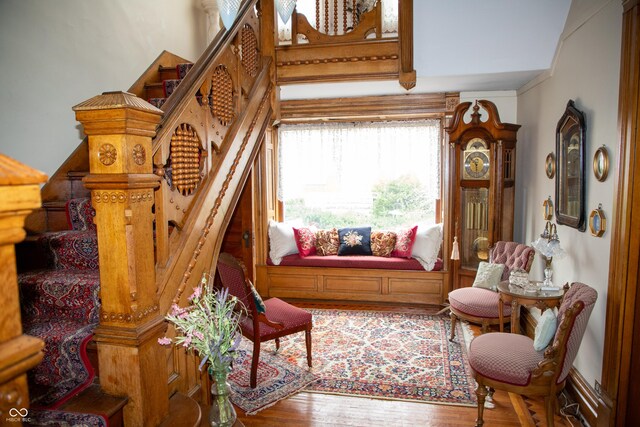 313 E Wabash Ave, Crawfordsville, IN 47933 - sitting room featuring wood finished floors and stairs