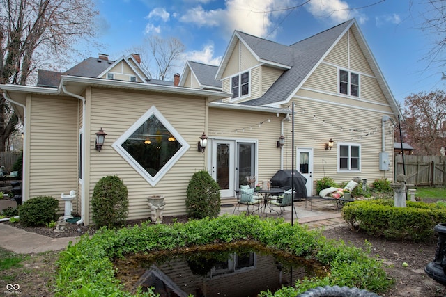 313 E Wabash Ave, Crawfordsville, IN 47933 - back of house featuring a patio area and fence