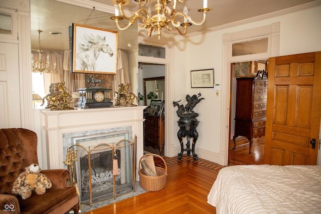 313 E Wabash Ave, Crawfordsville, IN 47933 - bedroom featuring crown molding, a fireplace, a notable chandelier, and baseboards