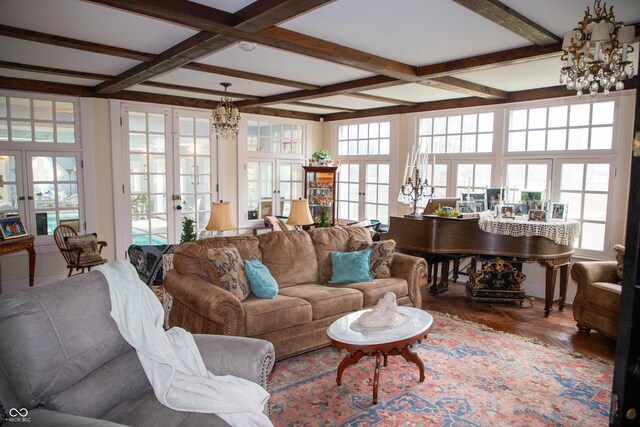 313 E Wabash Ave, Crawfordsville, IN 47933 - living room featuring coffered ceiling, french doors, and a chandelier