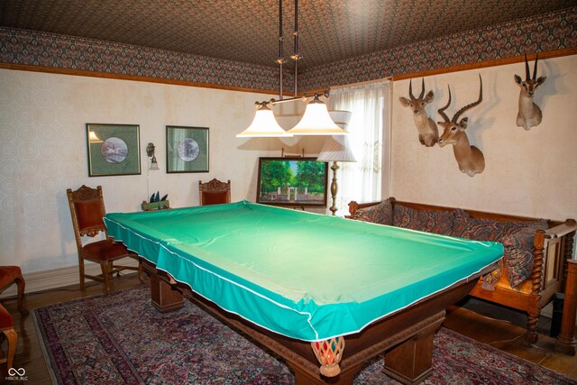 313 E Wabash Ave, Crawfordsville, IN 47933 - playroom with pool table, wallpapered walls, and wood finished floors
