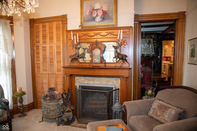 313 E Wabash Ave, Crawfordsville, IN 47933 - living area with carpet flooring, a chandelier, and a fireplace