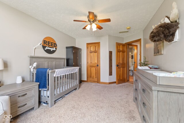 8095 Christopher Ct, Avon, IN 46123 - bedroom featuring light colored carpet, ceiling fan, baseboards, and a textured ceiling