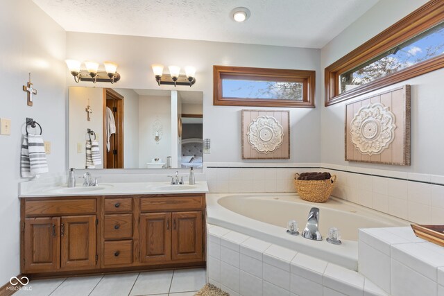 8095 Christopher Ct, Avon, IN 46123 - full bathroom featuring tile patterned flooring, plenty of natural light, and a sink