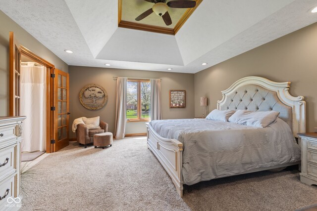 8095 Christopher Ct, Avon, IN 46123 - bedroom with carpet flooring, a tray ceiling, baseboards, recessed lighting, and ceiling fan