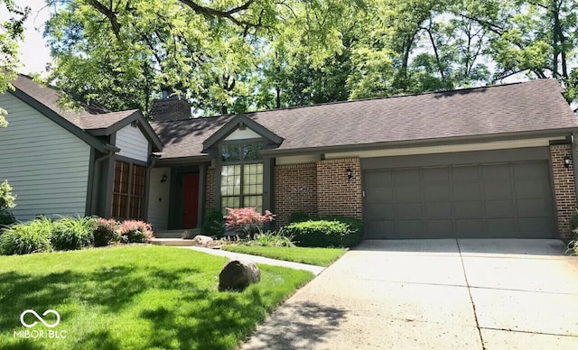 ranch-style house featuring a front yard, an attached garage, a chimney, concrete driveway, and brick siding