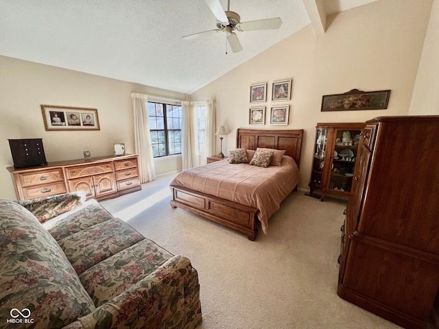 bedroom featuring high vaulted ceiling, light colored carpet, and ceiling fan