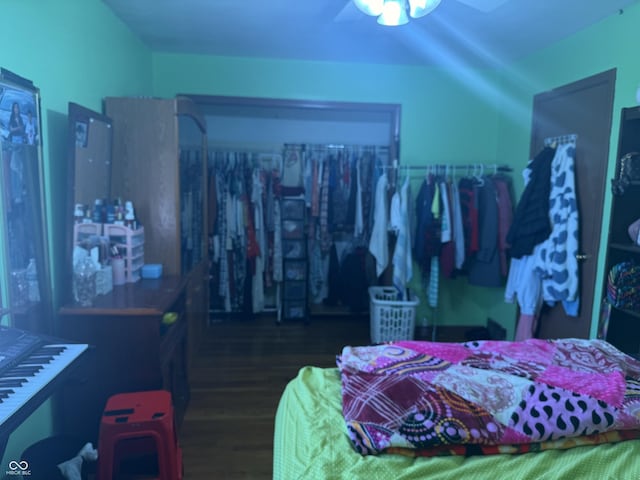 bedroom with ceiling fan and wood finished floors