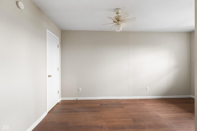 5713 Bluff Rd, Indianapolis, IN 46217 - spare room with wood finished floors, ceiling fan, and baseboards