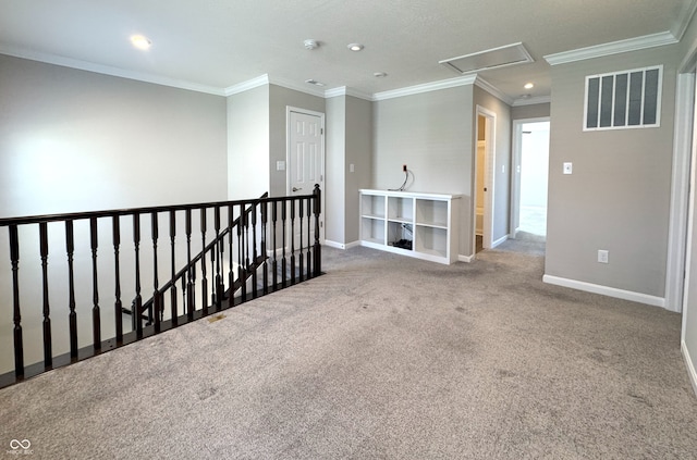 5493 W Woodhaven Dr, Mccordsville, IN 46055 - carpeted empty room with visible vents, baseboards, attic access, and ornamental molding