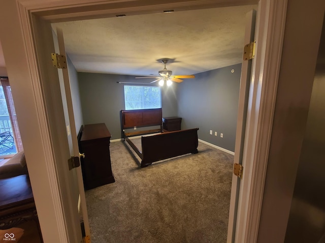 6525 Emerald Hill Ct Unit 208, Indianapolis, IN 46237 - carpeted bedroom with a ceiling fan and baseboards