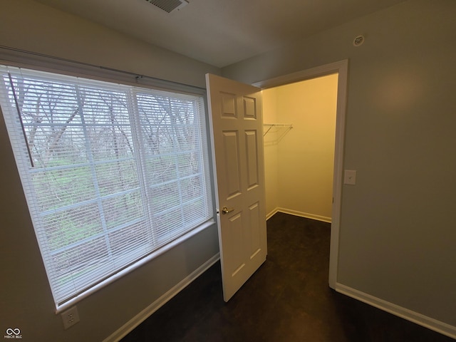 6525 Emerald Hill Ct Unit 208, Indianapolis, IN 46237 - interior space featuring a spacious closet, baseboards, visible vents, and a closet
