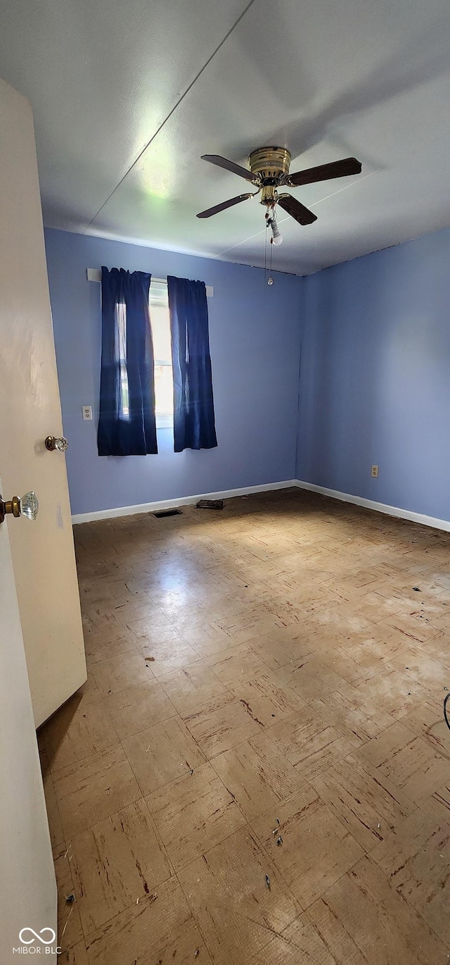 403 S Mill St, Veedersburg, IN 47987 - empty room with baseboards and a ceiling fan