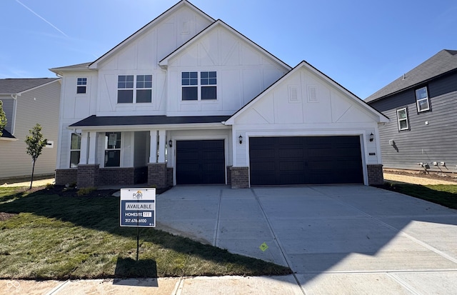 view of front of home featuring board and batten siding, brick siding, covered porch, driveway, and a front yard