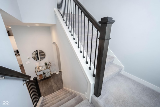 1534 Cloverdon Dr, Westfield, IN 46074 - stairway featuring baseboards and arched walkways