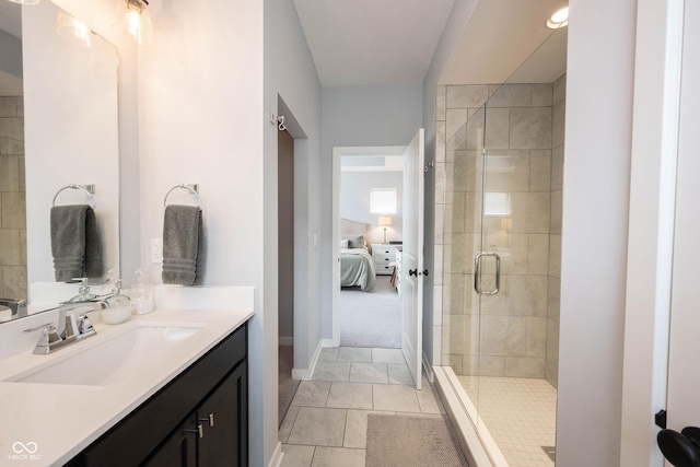 1534 Cloverdon Dr, Westfield, IN 46074 - bathroom with vanity, connected bathroom, a shower stall, and baseboards