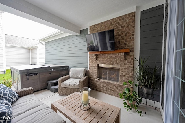 1534 Cloverdon Dr, Westfield, IN 46074 - view of patio with a hot tub and an outdoor living space with a fireplace