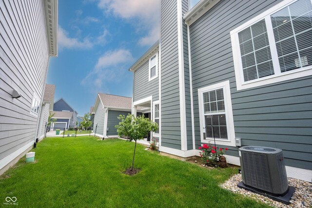 1534 Cloverdon Dr, Westfield, IN 46074 - view of grassy yard featuring central AC