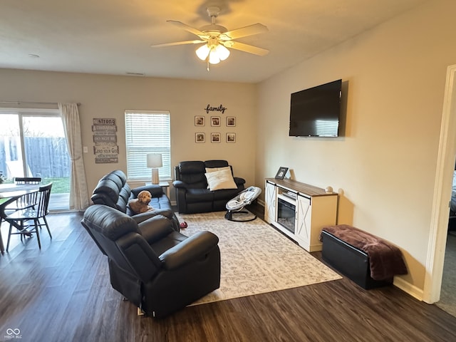 914 Baden Manor Dr, Indianapolis, IN 46217 - living room with dark wood-style floors and a ceiling fan
