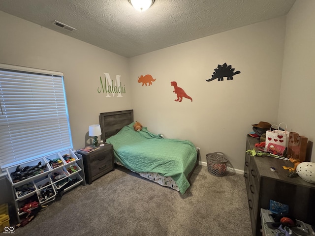 914 Baden Manor Dr, Indianapolis, IN 46217 - carpeted bedroom featuring baseboards and a textured ceiling