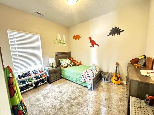 914 Baden Manor Dr, Indianapolis, IN 46217 - carpeted bedroom featuring a textured ceiling