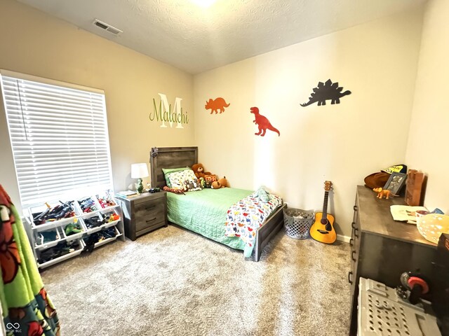 914 Baden Manor Dr, Indianapolis, IN 46217 - bedroom featuring a textured ceiling and carpet flooring