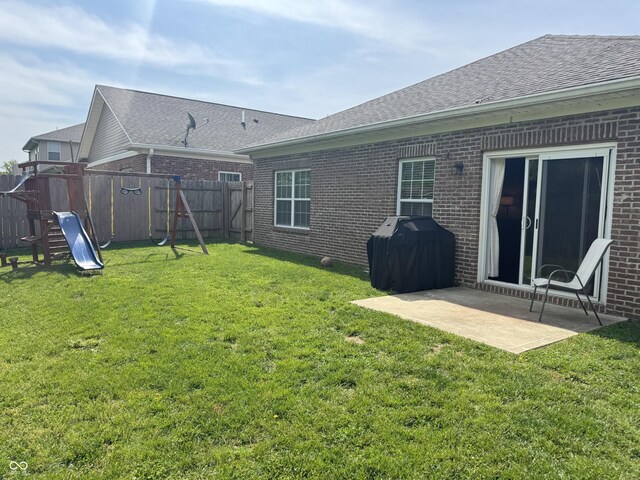 914 Baden Manor Dr, Indianapolis, IN 46217 - view of yard featuring a playground and a patio